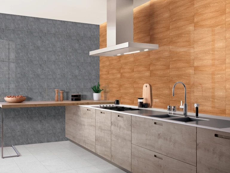 Modern L shape kitchen design with wood and grey tiles, an elegant chimney, and sleek finishes.